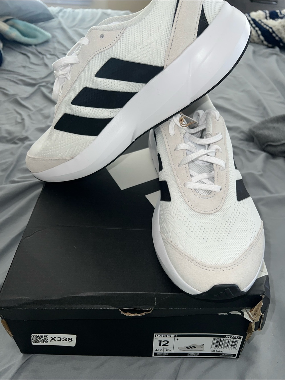 adidas Men’s White Sneakers with Black Three-Stripes